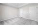 Spacious bedroom with neutral carpet and multiple doors at 4768 Score Ct, Snellville, GA 30039