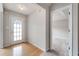 Inviting entryway with hardwood floors and a view to bedroom at 4768 Score Ct, Snellville, GA 30039