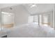 Open living room with multiple doorways and transitional flooring at 4768 Score Ct, Snellville, GA 30039