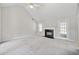 Bright living room with fireplace, vaulted ceiling, and natural light at 4768 Score Ct, Snellville, GA 30039