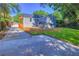 A spacious backyard with ample parking, a small porch, and a well-kept lawn at 672 Quillian Ave, Decatur, GA 30032