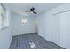 A bright bedroom is freshly painted and well lit with natural light and features a closet at 672 Quillian Ave, Decatur, GA 30032