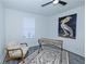 A well-lit bedroom features a ceiling fan, and a print of a pelican on the wall at 672 Quillian Ave, Decatur, GA 30032
