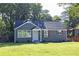 A charming home with a well-manicured lawn and freshly painted exterior, offering great curb appeal at 672 Quillian Ave, Decatur, GA 30032