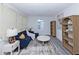 Bright living room featuring modern decor, new floors, and lots of natural light at 672 Quillian Ave, Decatur, GA 30032