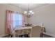 Bright dining area offering abundant light, perfect for intimate gatherings or Gathering meals at 879 Tranquil Way, Hampton, GA 30228