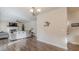 Well-decorated living room with a fireplace and stylish furniture at 879 Tranquil Way, Hampton, GA 30228