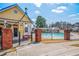 Gated community pool with clubhouse and lounge area offers a refreshing oasis for residents to enjoy at 140 Ryan Ln, Covington, GA 30014