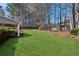 Expansive, well-manicured backyard lawn offering ample space for recreation and outdoor enjoyment at 2688 Stockbridge Way, Dacula, GA 30019