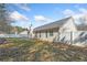 Exterior view of the backyard with fenced in area and a well-maintained lawn, creating a private outdoor space at 55 Vintage Dr, Covington, GA 30014