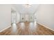 Spacious living room features wood floors, high ceilings, and a bright entryway at 55 Vintage Dr, Covington, GA 30014