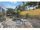 Stone patio with seating area and fountain provides a private outdoor space at 818 Virgil Ne St, Atlanta, GA 30307