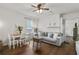 Comfortable living room with hardwood floors, sofa, and a decorative fireplace mantle at 818 Virgil Ne St, Atlanta, GA 30307