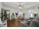 Bright living room featuring hardwood floors, a comfortable sofa, and lots of natural light at 818 Virgil Ne St, Atlanta, GA 30307