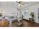 Cozy living room featuring hardwood floors, comfortable sofa, and bench near window at 818 Virgil Ne St, Atlanta, GA 30307