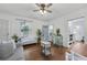 Cozy living room with hardwood floors, a comfortable sofa, and views into the kitchen at 818 Virgil Ne St, Atlanta, GA 30307