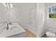Bathroom with double sink, shower, and toilet at 1868 Lacebark Elm Way, Lawrenceville, GA 30045