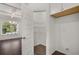 Pantry features convenient storage shelves and access to dining area at 1868 Lacebark Elm Way, Lawrenceville, GA 30045