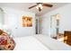 Comfortable bedroom featuring hardwood floors, crisp white walls, and access to both a bathroom and a walk-in closet at 2976 Emory Se Rd, Smyrna, GA 30080