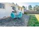 Outdoor stone patio with a dining table and chairs, ideal for relaxing or entertaining at 2976 Emory Se Rd, Smyrna, GA 30080