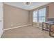 Comfortable bedroom with natural light and neutral carpeting at 115 Trelawney Cir, Covington, GA 30016