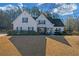 Charming traditional home with well-maintained landscaping and a welcoming front entrance at 115 Trelawney Cir, Covington, GA 30016