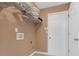 Convenient laundry room with ample shelving and storage at 115 Trelawney Cir, Covington, GA 30016