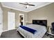 Spacious bedroom with neutral walls and ceiling fan at 1406 River Green Nw Dr, Atlanta, GA 30327