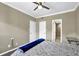 Bedroom with a ceiling fan, neutral paint and two closets near the bed at 1406 River Green Nw Dr, Atlanta, GA 30327