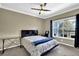 Well-lit bedroom with large window and calming decor at 1406 River Green Nw Dr, Atlanta, GA 30327