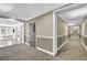 Hallway with neutral color palette and decorative carpet at 1406 River Green Nw Dr, Atlanta, GA 30327