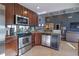 Modern kitchen with stainless steel appliances and granite countertops at 1406 River Green Nw Dr, Atlanta, GA 30327