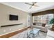 Comfortable living room with plush couches and a large window at 1406 River Green Nw Dr, Atlanta, GA 30327