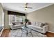 Cozy living room with a ceiling fan and natural light at 1406 River Green Nw Dr, Atlanta, GA 30327