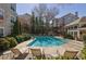 Community pool with lounge chairs, perfect for relaxation at 1406 River Green Nw Dr, Atlanta, GA 30327