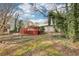 Backyard shot of a stained wooden deck, perfect for outdoor gatherings and relaxing at 2090 Walden Park, Snellville, GA 30078