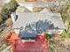 Aerial view of a backyard featuring a spacious wooden deck and lush surrounding greenery at 2090 Walden Park, Snellville, GA 30078