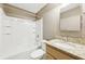 Bathroom featuring shower and tub combination and single sink vanity with granite countertop at 2090 Walden Park, Snellville, GA 30078