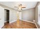Bedroom features hardwood floors, ceiling fan and closet at 2090 Walden Park, Snellville, GA 30078
