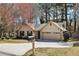 Charming single-story home, viewed from the driveway with a mailbox in front of the property at 2090 Walden Park, Snellville, GA 30078