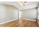 Comfortable main bedroom with hardwood floors, neutral walls, and access to ensuite bathroom at 2090 Walden Park, Snellville, GA 30078