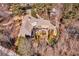 Aerial shot of a home showcasing an expansive deck and manicured landscaping at 3832 Wesley Chapel Rd, Marietta, GA 30062