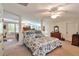Spacious bedroom with a sitting area, lots of natural light, and bright, airy design at 3832 Wesley Chapel Rd, Marietta, GA 30062