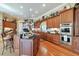 Gourmet kitchen with ample counter space, custom cabinetry, and stainless steel appliances in a luxury home at 3832 Wesley Chapel Rd, Marietta, GA 30062