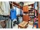 Walk-in closet featuring custom wooden shelving and a cozy bench for added convenience at 3832 Wesley Chapel Rd, Marietta, GA 30062