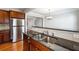 Spacious kitchen with stainless steel appliances and double sink at 4550 Cold Spring Ct, Cumming, GA 30041