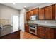 Well-equipped kitchen features stainless steel appliances and granite countertops at 4550 Cold Spring Ct, Cumming, GA 30041