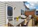 Relaxing patio with outdoor furniture and a charming garden view, perfect for entertaining at 4550 Cold Spring Ct, Cumming, GA 30041