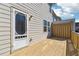 Cozy patio with a decorative door and privacy fence, ideal for outdoor relaxation at 4550 Cold Spring Ct, Cumming, GA 30041