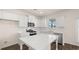 Bright, modern kitchen with stainless steel appliances and white countertops at 1069 Blue Juniper Cir, Loganville, GA 30052